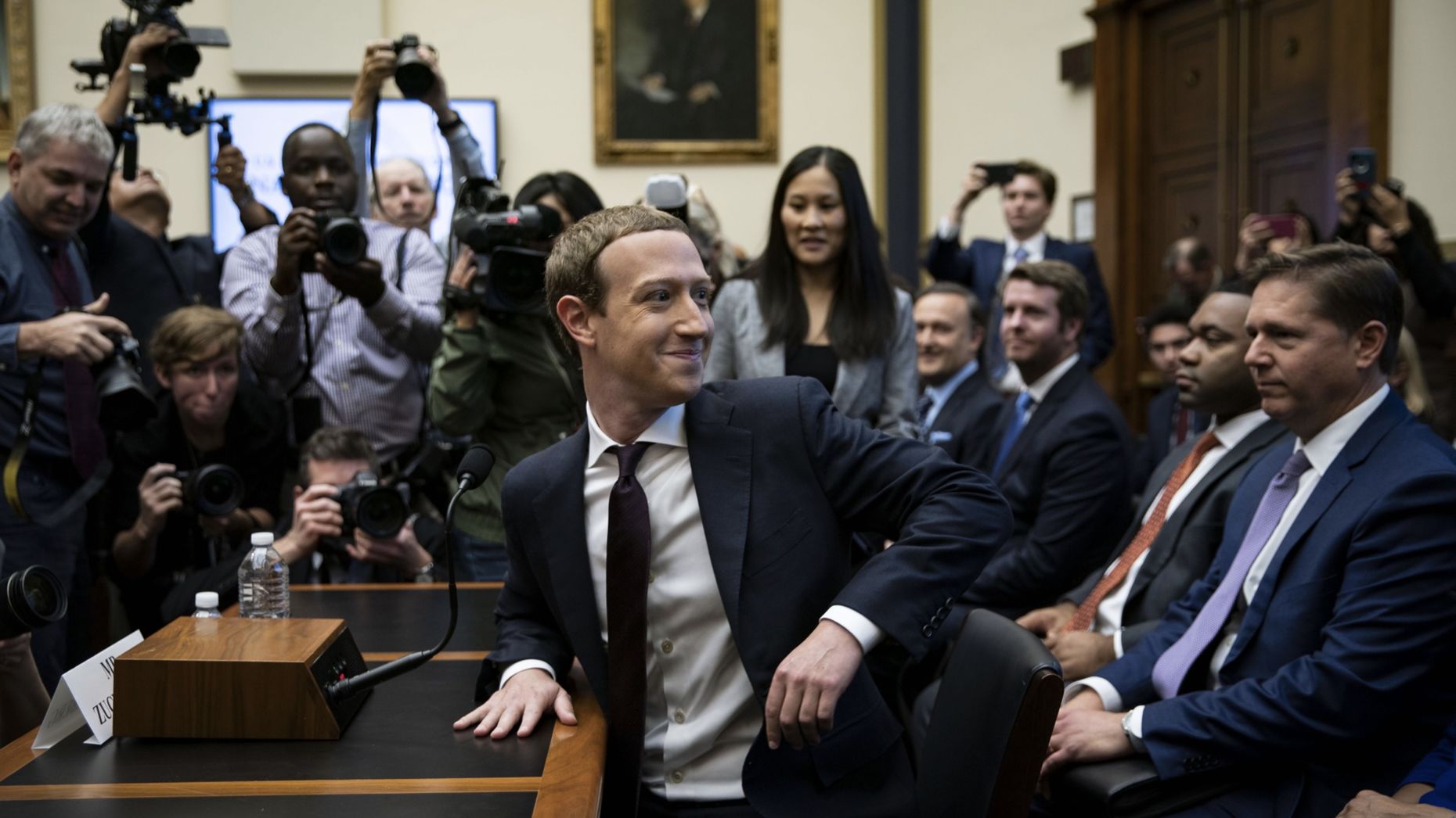 Facebook CEO Mark Zuckerberg at a congressional hearing last year. Facebook's U.S. public policy vice president Kevin Martin is sitting behind him. Photo by Bloomberg